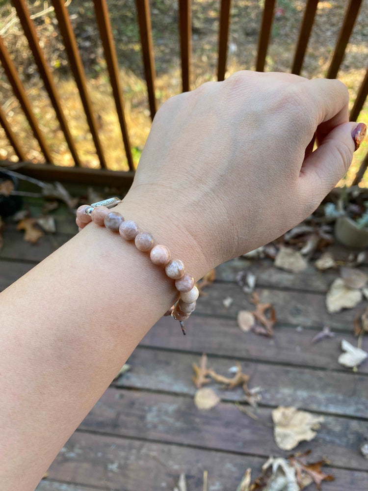 
                  
                    Peach Moonstone with Elephant Charm Bracelets
                  
                