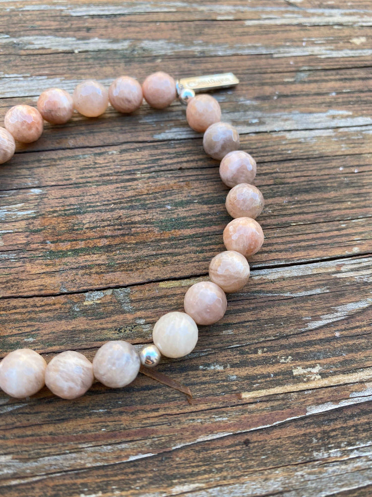 
                  
                    Peach Moonstone with Elephant Charm Bracelets
                  
                