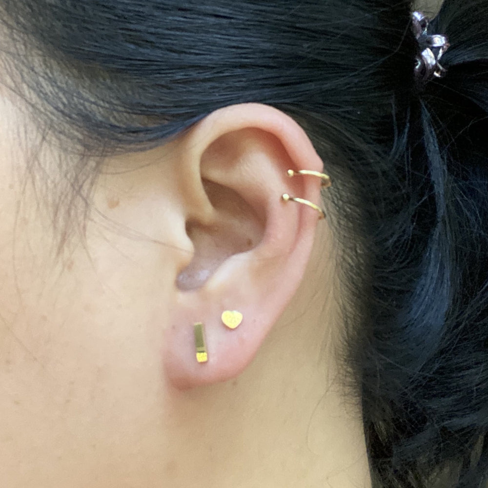 
                  
                    Donna Geometric Minimalist Stud Earrings
                  
                