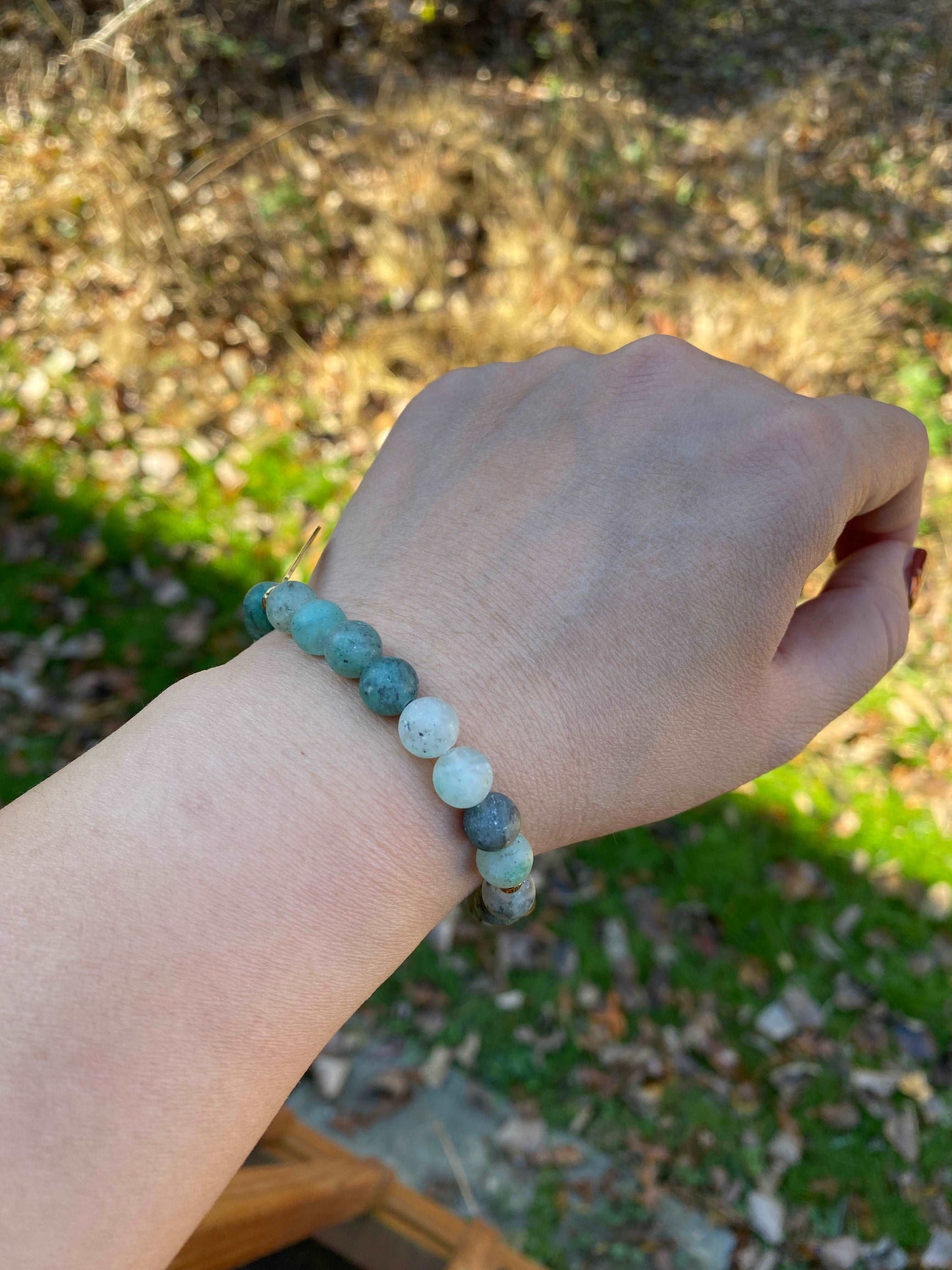 
                  
                    Matte Blue Green Quartz with Ohm Charm Bracelets
                  
                