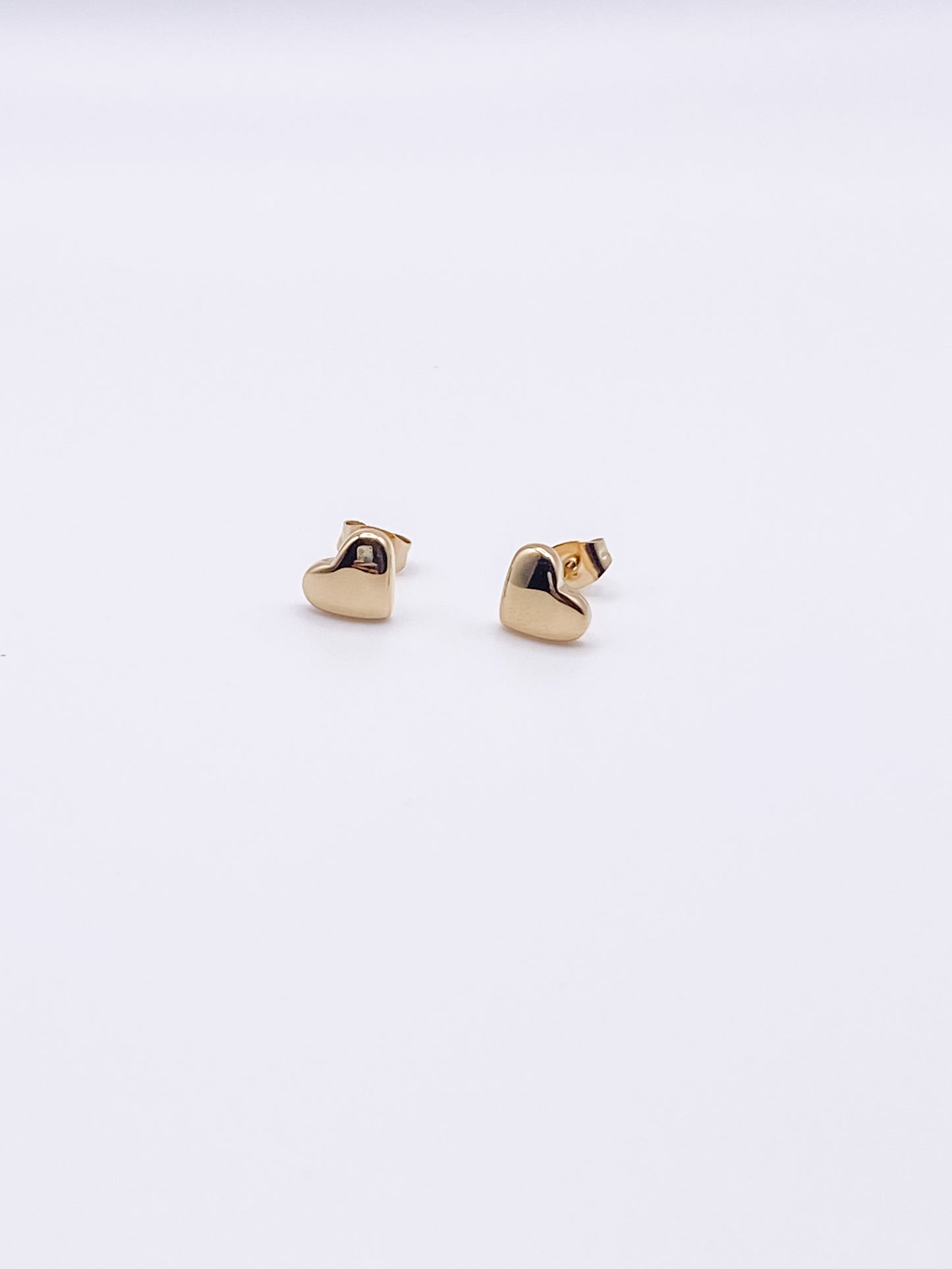 
                  
                    Mini Heart Shaped Stud Earrings
                  
                