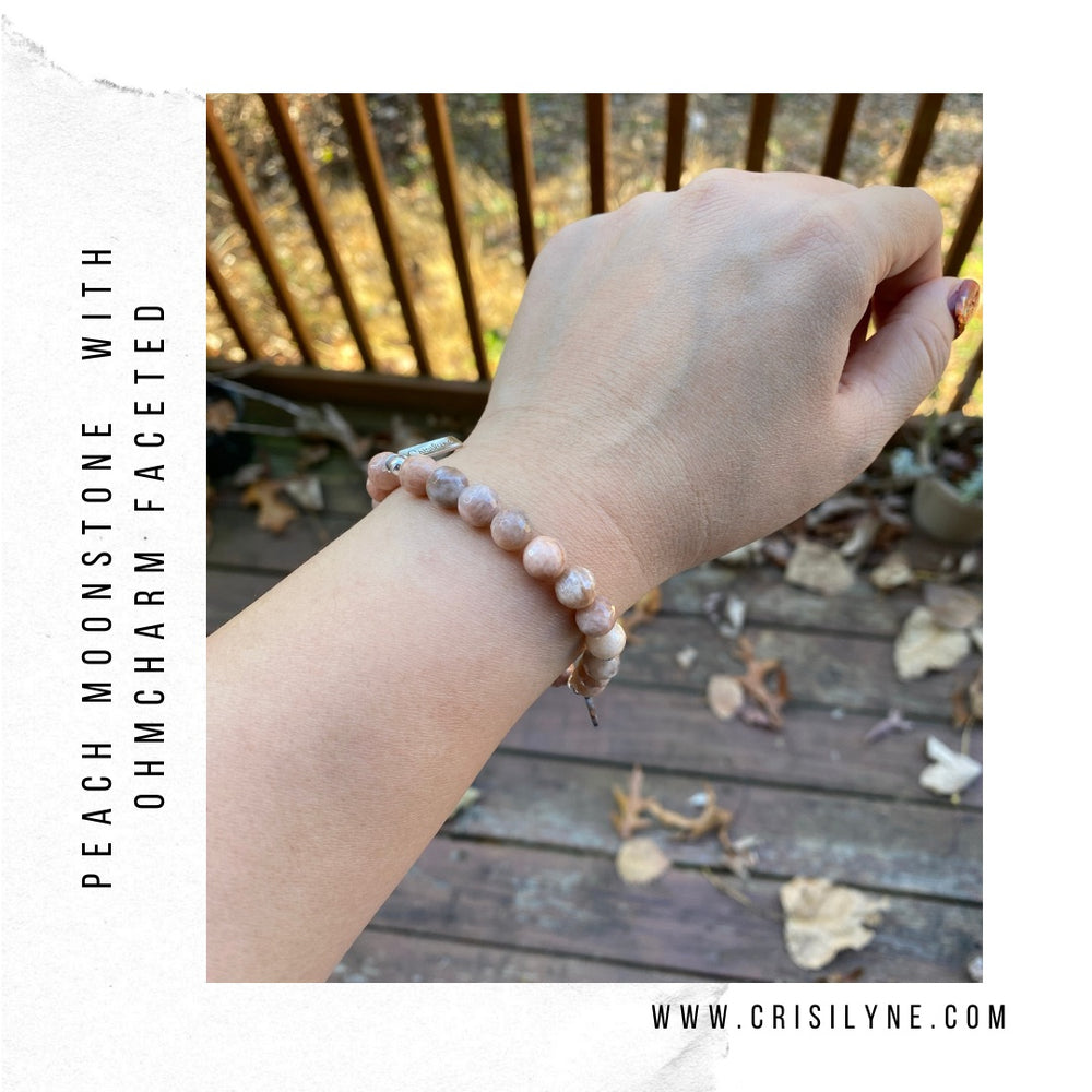 
                  
                    Peach Moonstone with Wing Charm Bracelets
                  
                