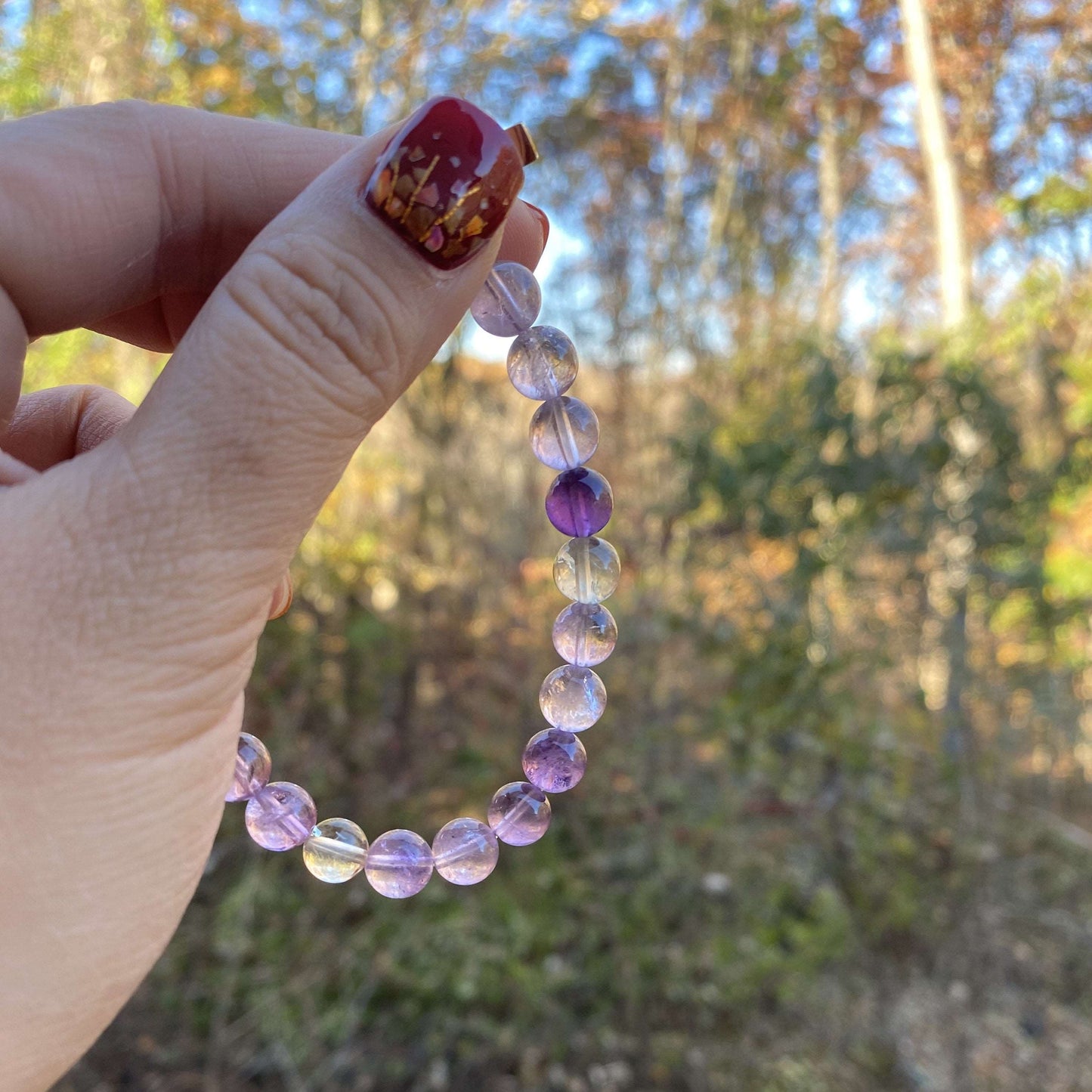 
                  
                    Alyssa - Ametrine with Moon Charm
                  
                