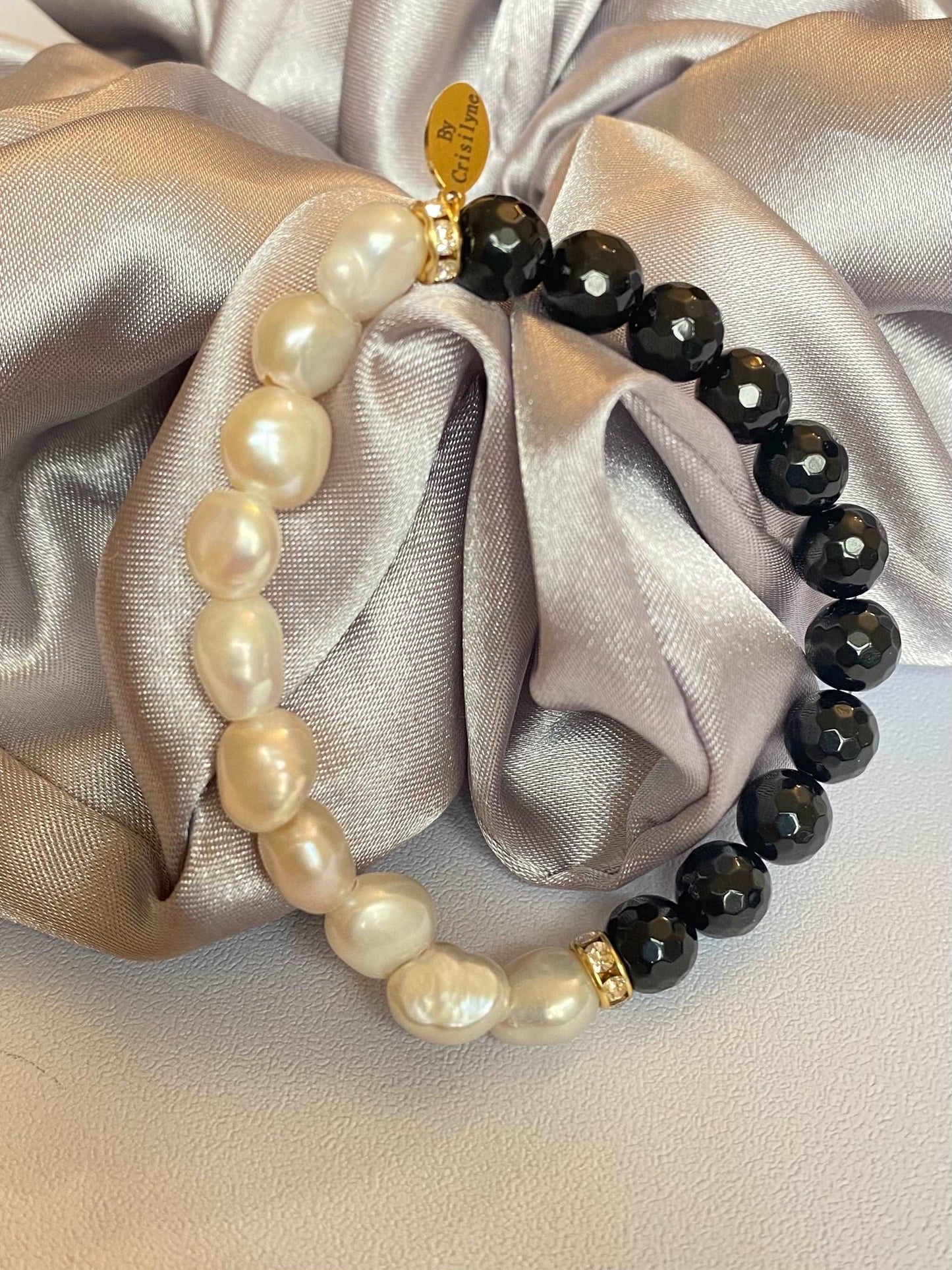 
                  
                    Onyx with Baroque Pearls Bracelets
                  
                
