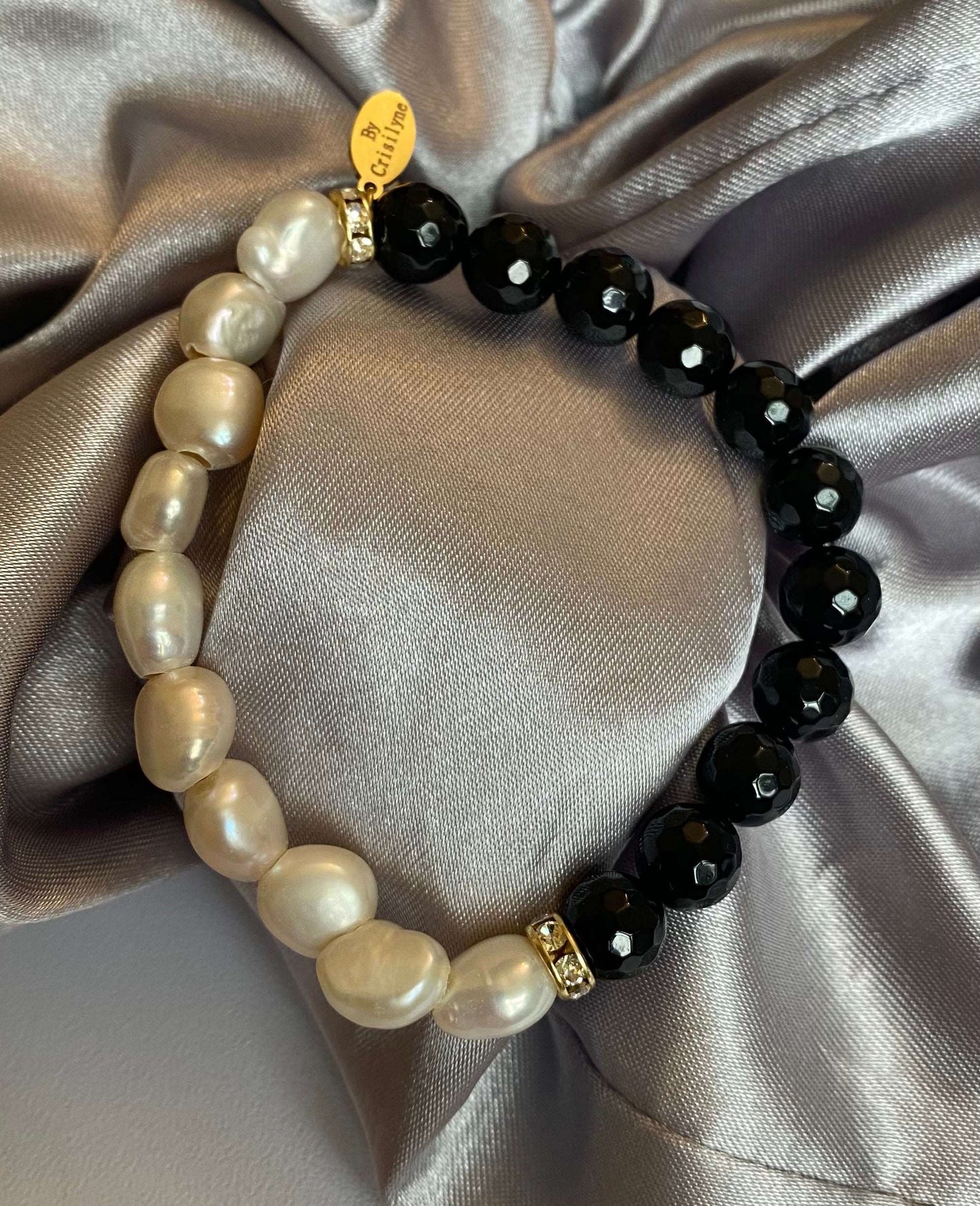 
                  
                    Onyx with Baroque Pearls Bracelets
                  
                