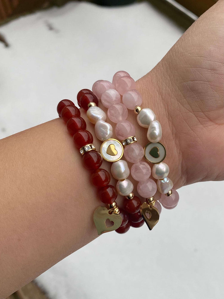 
                  
                    Rose Quartz with Heart Charm Bracelets
                  
                